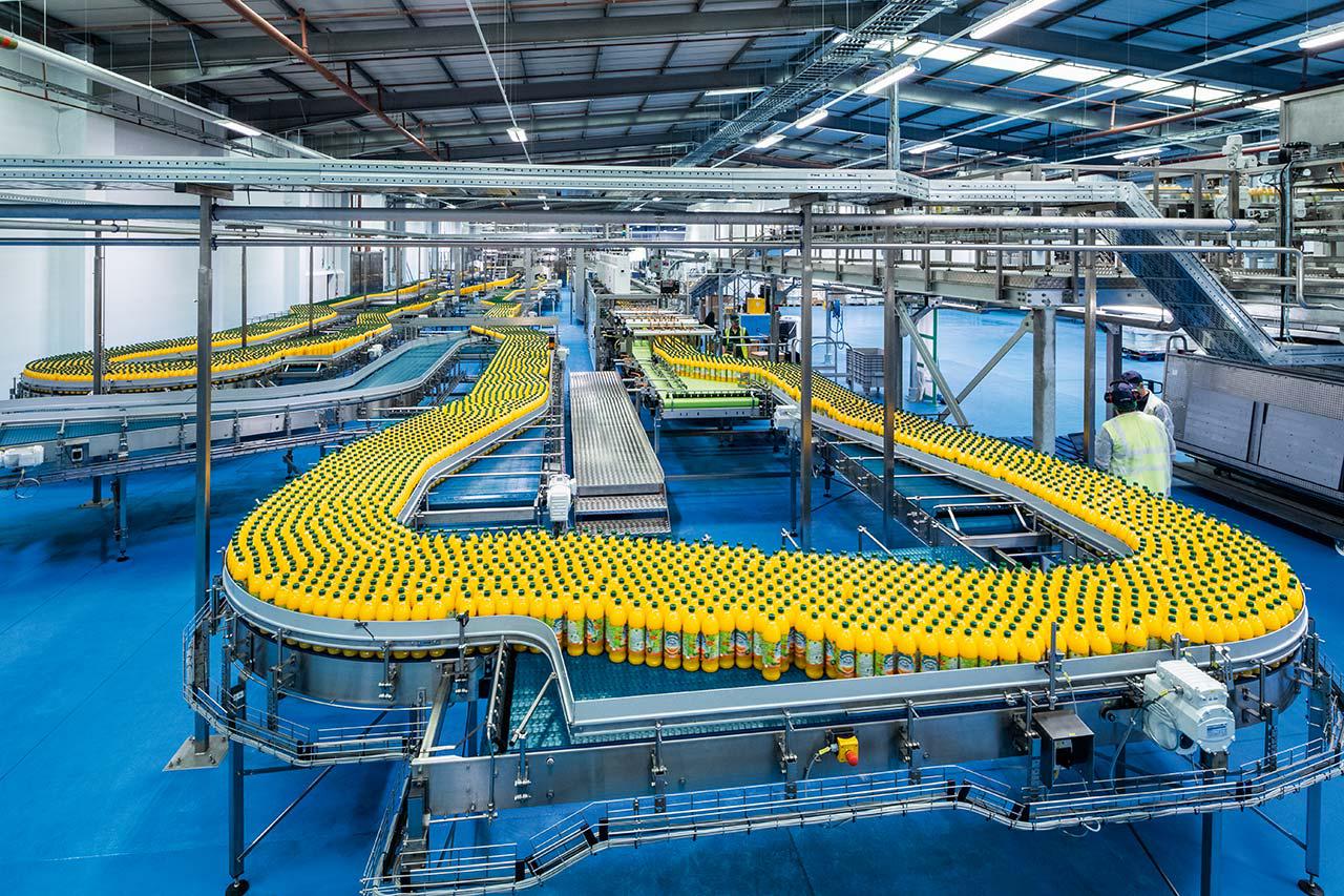 時產1000-36000瓶果汁飲料灌裝生產線采用PLC控制
